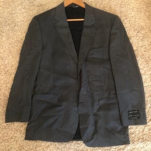 Jos. A. Bank dark grey suit with pink neck tie.